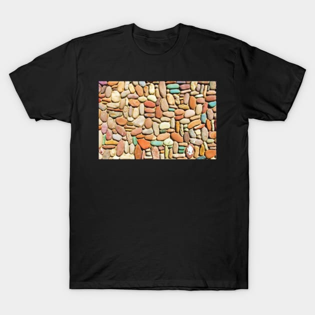 Pebbles. T-Shirt by bulljup